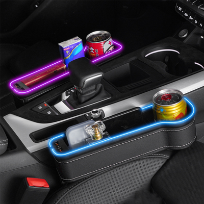 Boîte de rangement multifonctionnelle pour l'espace entre les sièges de voiture, avec lumière LED